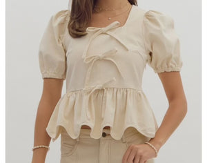 Row Of Bows Peplum Top Cream